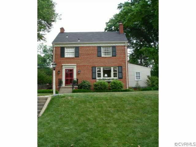 1007 Horsepen Road Richmond, VA 23229 - Photo 1 of 8 a front view of a house with a yard