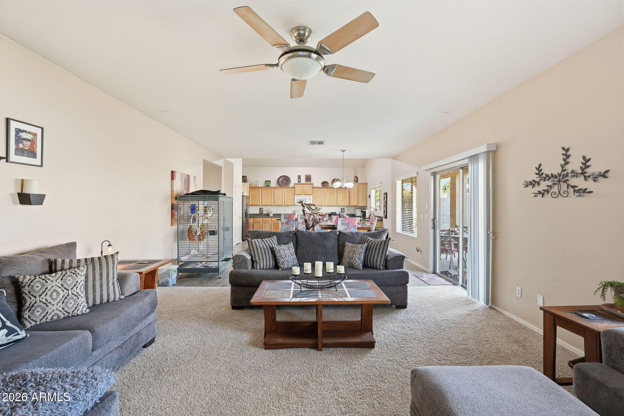 17760 West Charter Oak Road Surprise, AZ 85388 - Photo 12 of 45 a living room with furniture and a large window