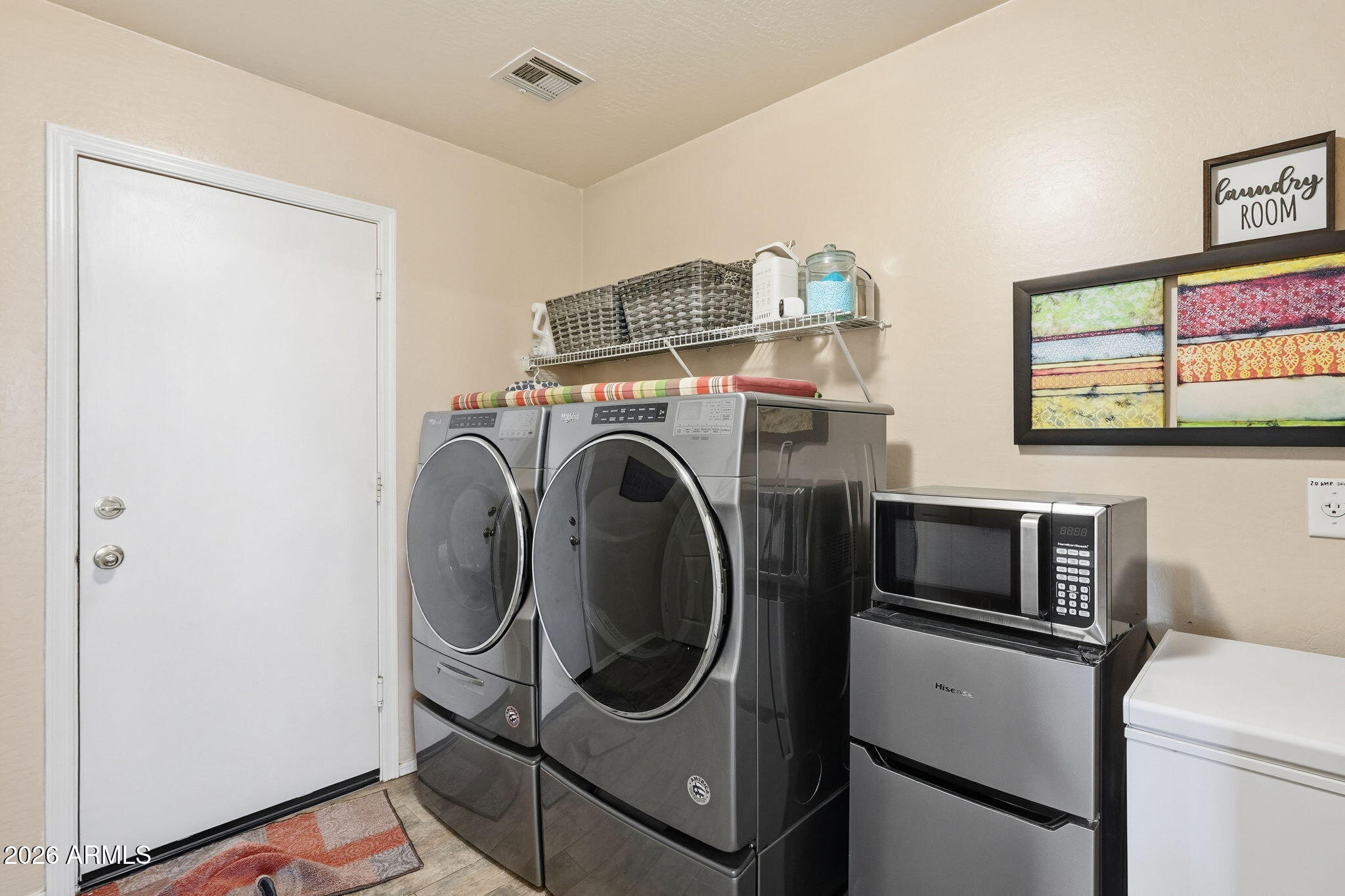 17760 West Charter Oak Road Surprise, AZ 85388 - Photo 39 of 45 a utility room with dryer and washer