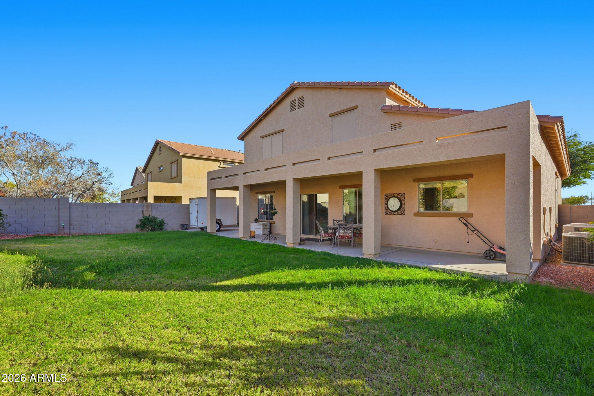 17760 West Charter Oak Road Surprise, AZ 85388 - Photo 45 of 45 a front view of a house with a yard and porch