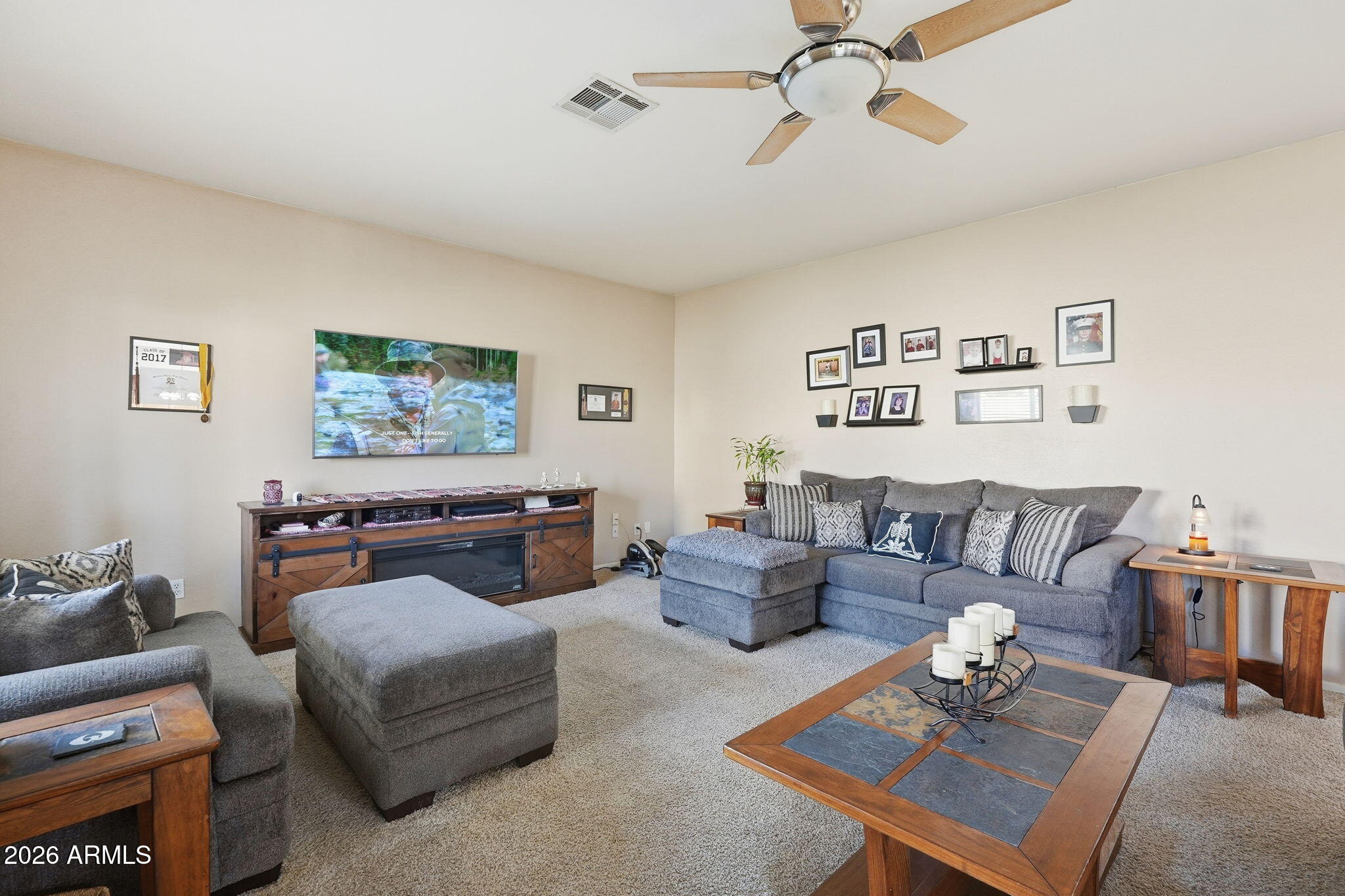17760 West Charter Oak Road Surprise, AZ 85388 - Photo 8 of 45 a living room with furniture and a couch