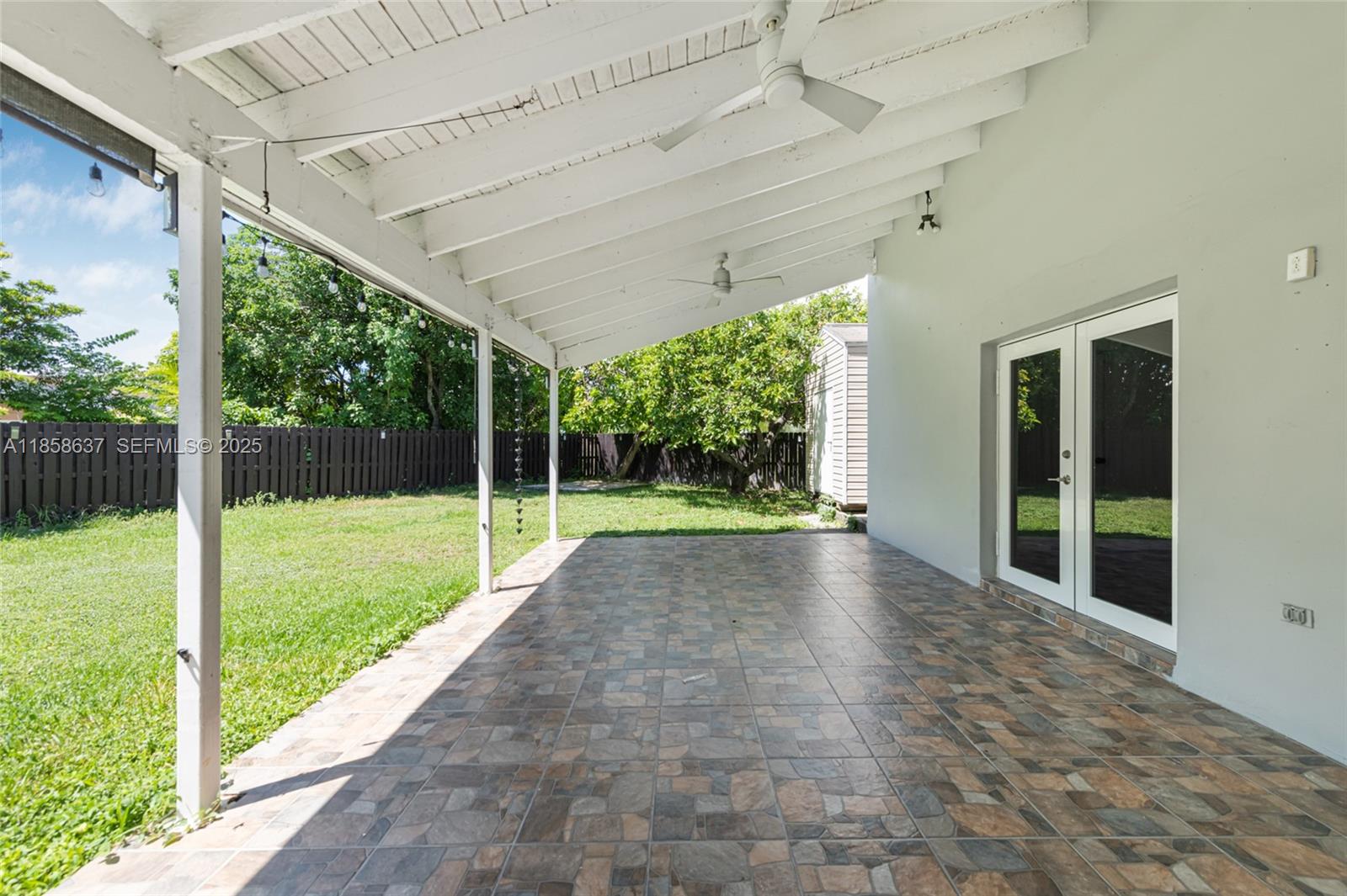 11518 Southwest 174th Street Miami, FL 33157 - Photo 22 of 27 a view of backyard with green space