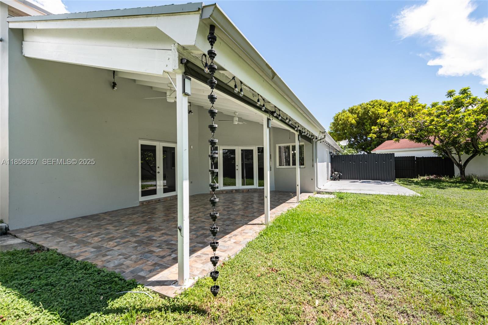 11518 Southwest 174th Street Miami, FL 33157 - Photo 23 of 27 a front view of a house with garden
