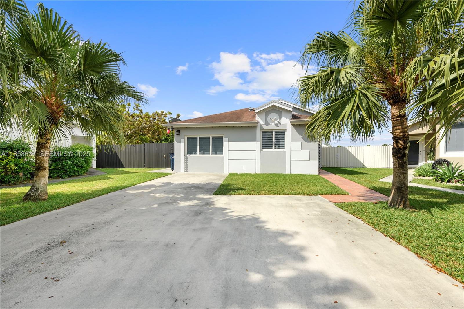 11518 Southwest 174th Street Miami, FL 33157 - Photo 4 of 27 a view of a house with a yard
