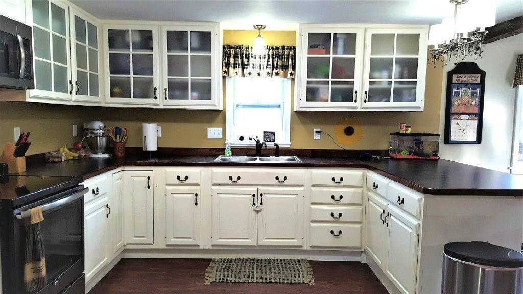 455 Wentworth Road Embden, ME 04958 - Photo 2 of 35 Kitchen is spacious with plenty of...