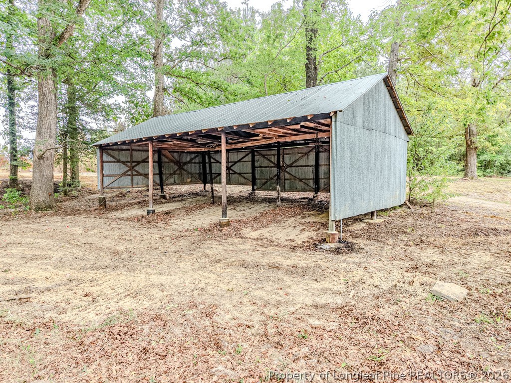 2957 Cypress Church Road Cameron, NC 28326 - Photo 44 of 48 3 bay Tractor Shed