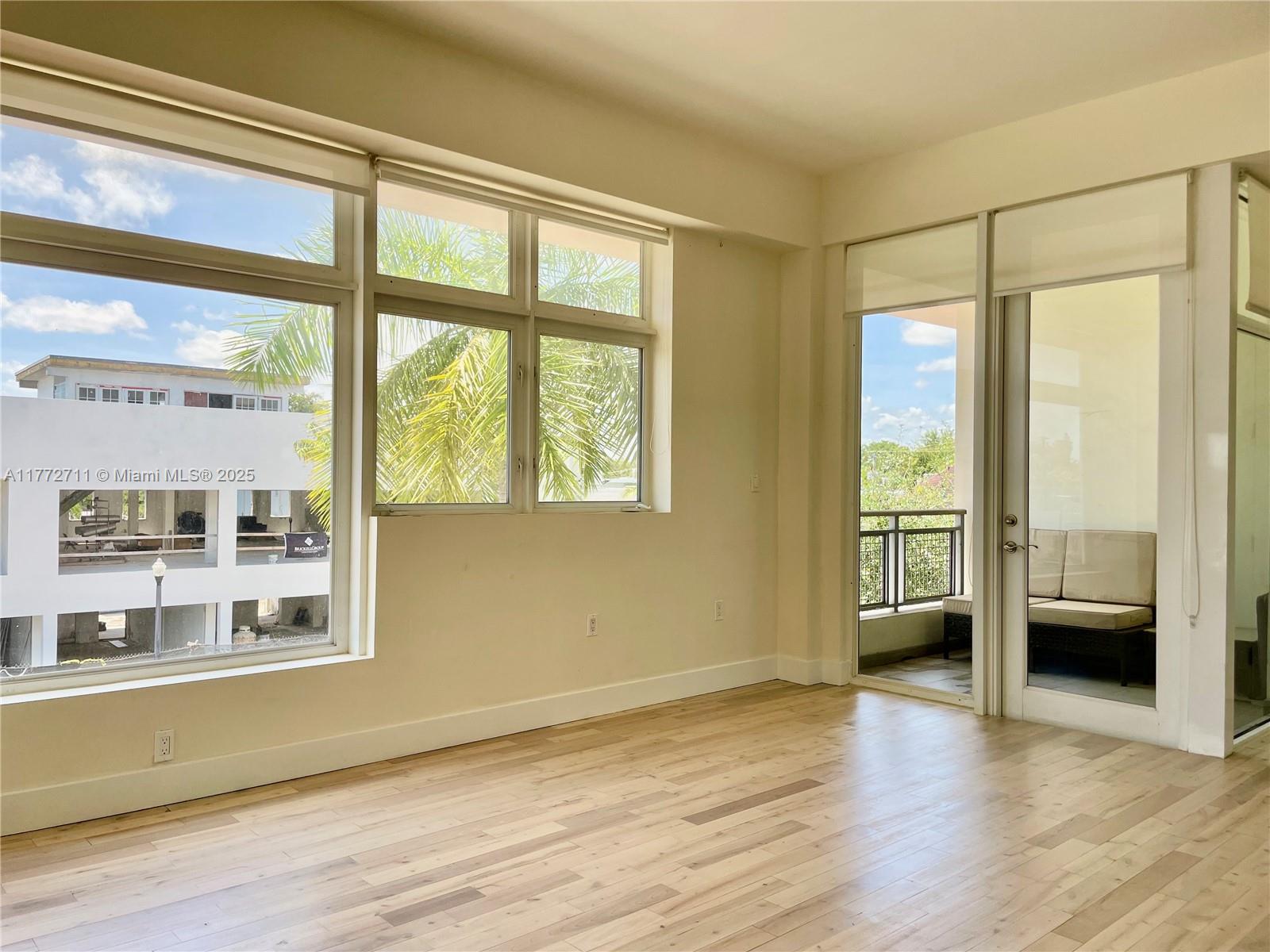6701 Biscayne Boulevard, Unit 201 Miami, FL 33138 - Photo 11 of 22 a view of livingroom with furniture and window