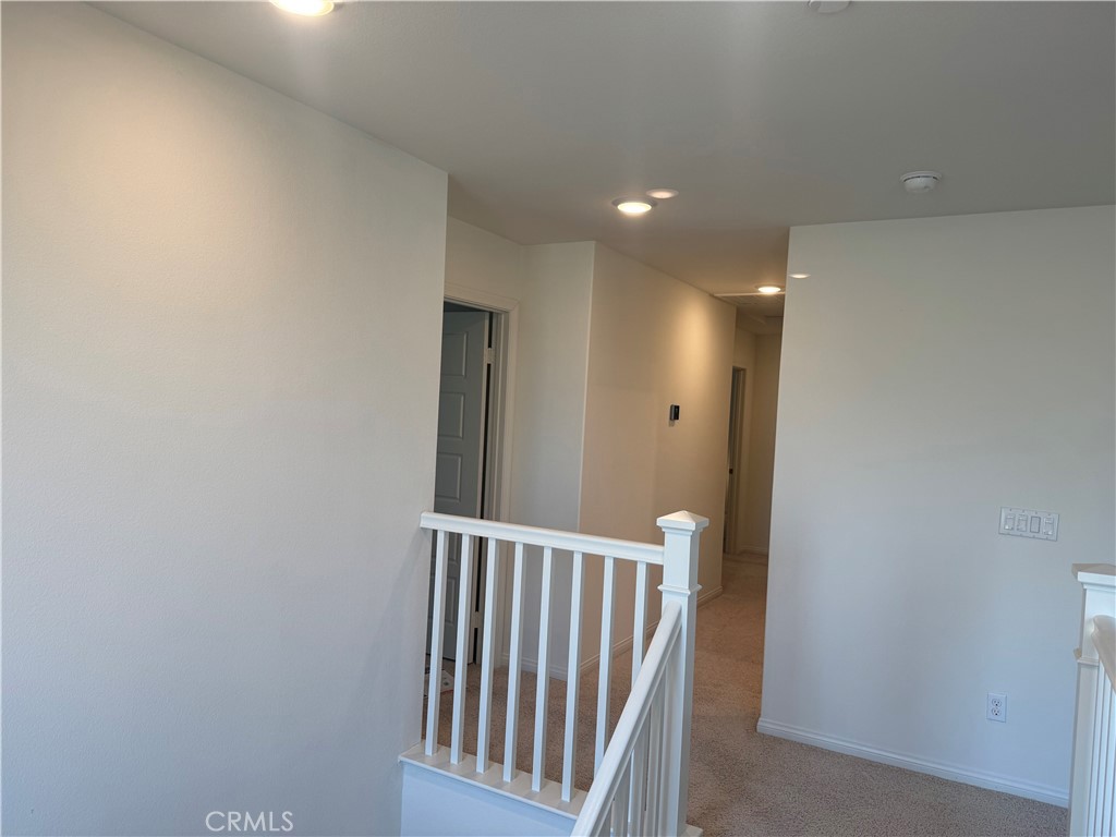 28582 Buttercup Way Moreno Valley, CA 92555 - Photo 26 of 55 a view of staircase with rug floor