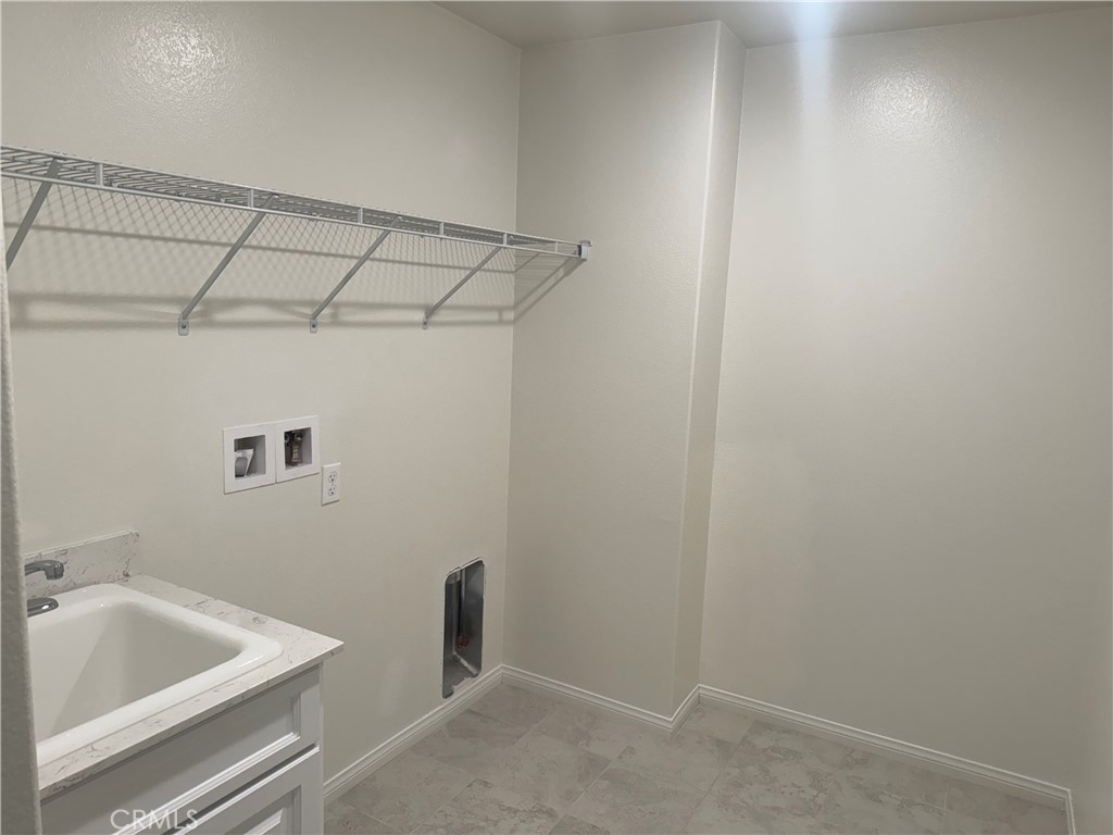 28582 Buttercup Way Moreno Valley, CA 92555 - Photo 32 of 55 a bathroom with a tub and shower