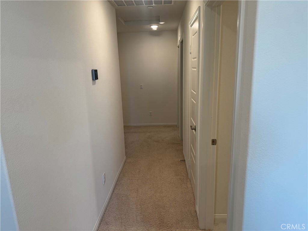 28582 Buttercup Way Moreno Valley, CA 92555 - Photo 33 of 55 a view of a hallway