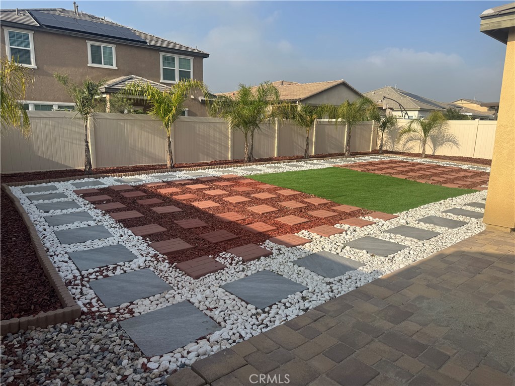 28582 Buttercup Way Moreno Valley, CA 92555 - Photo 48 of 55 a front view of a house with a yard