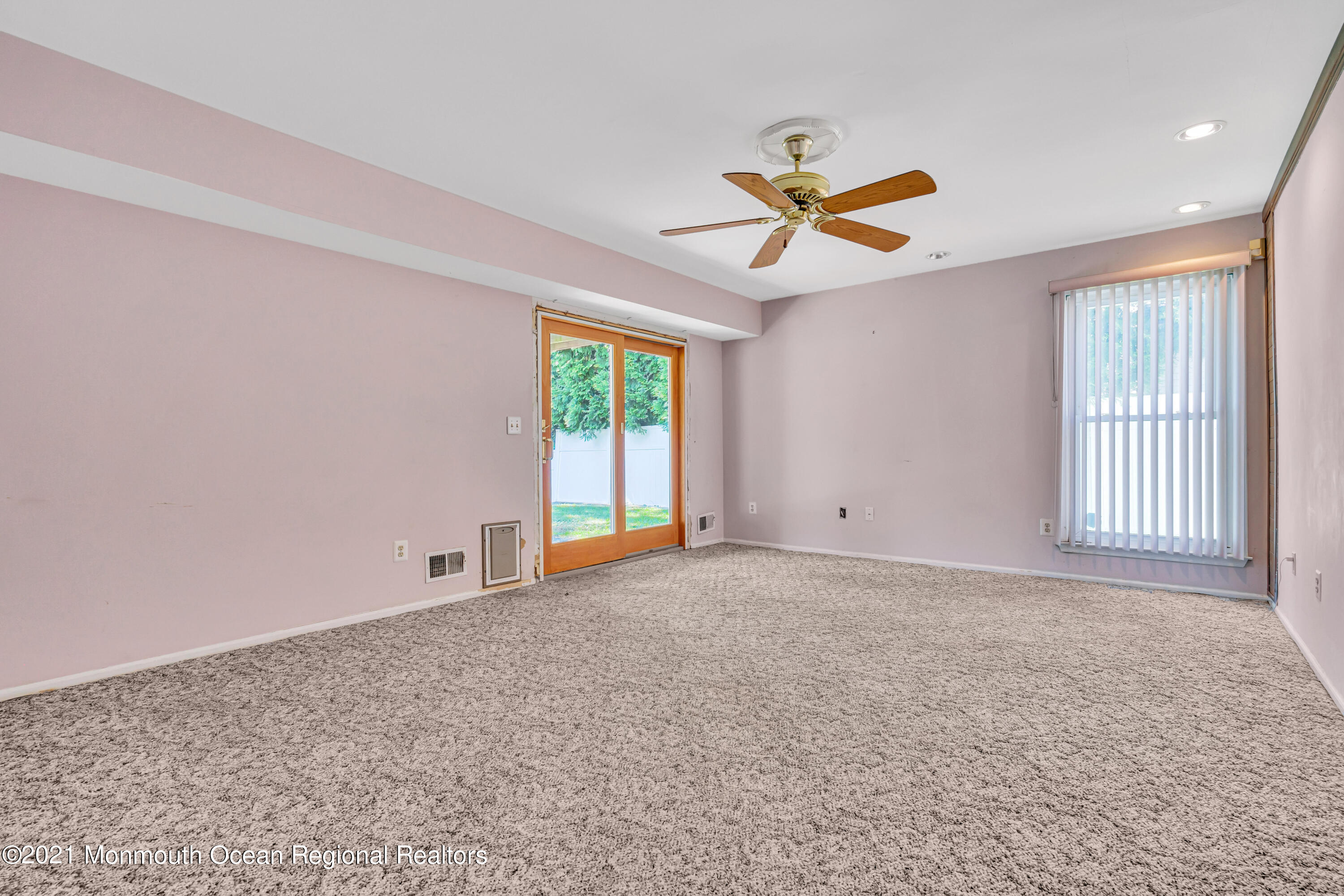 16 Marc Drive Howell, NJ 07731 - Photo 13 of 29 an empty room with windows and fan