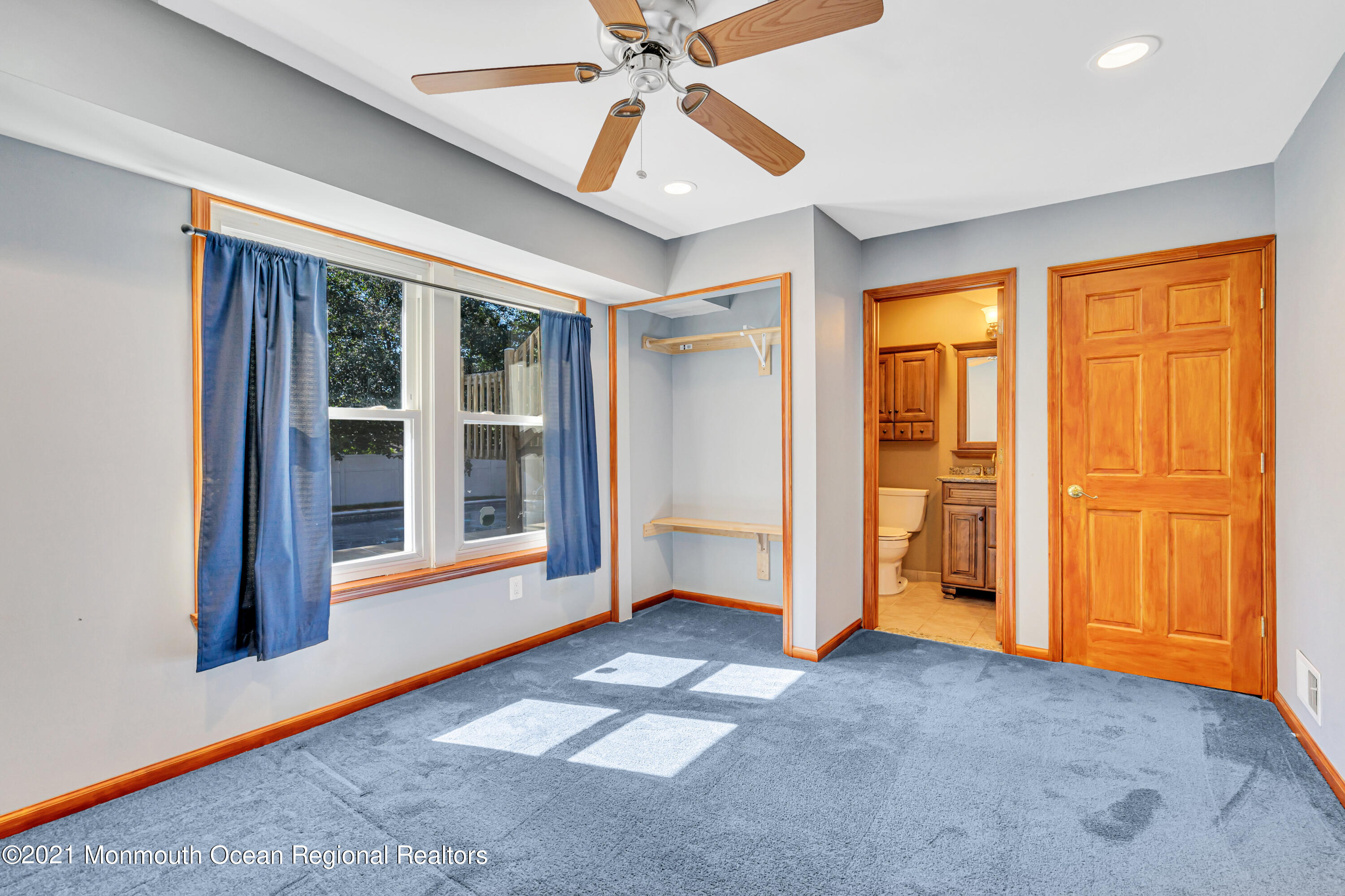 16 Marc Drive Howell, NJ 07731 - Photo 15 of 29 an empty room with chandelier fan and windows