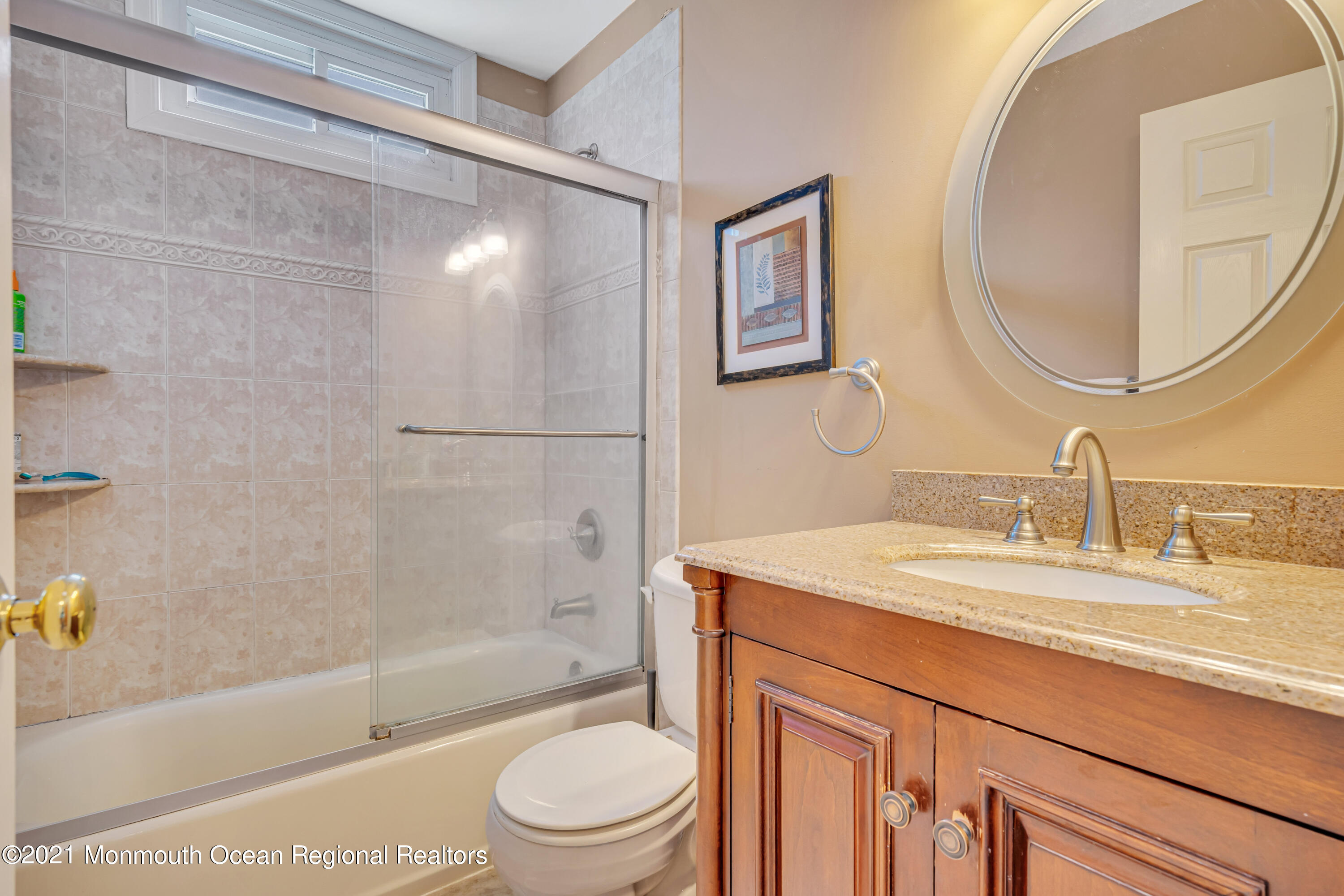 16 Marc Drive Howell, NJ 07731 - Photo 19 of 29 a bathroom with a granite countertop sink toilet and shower
