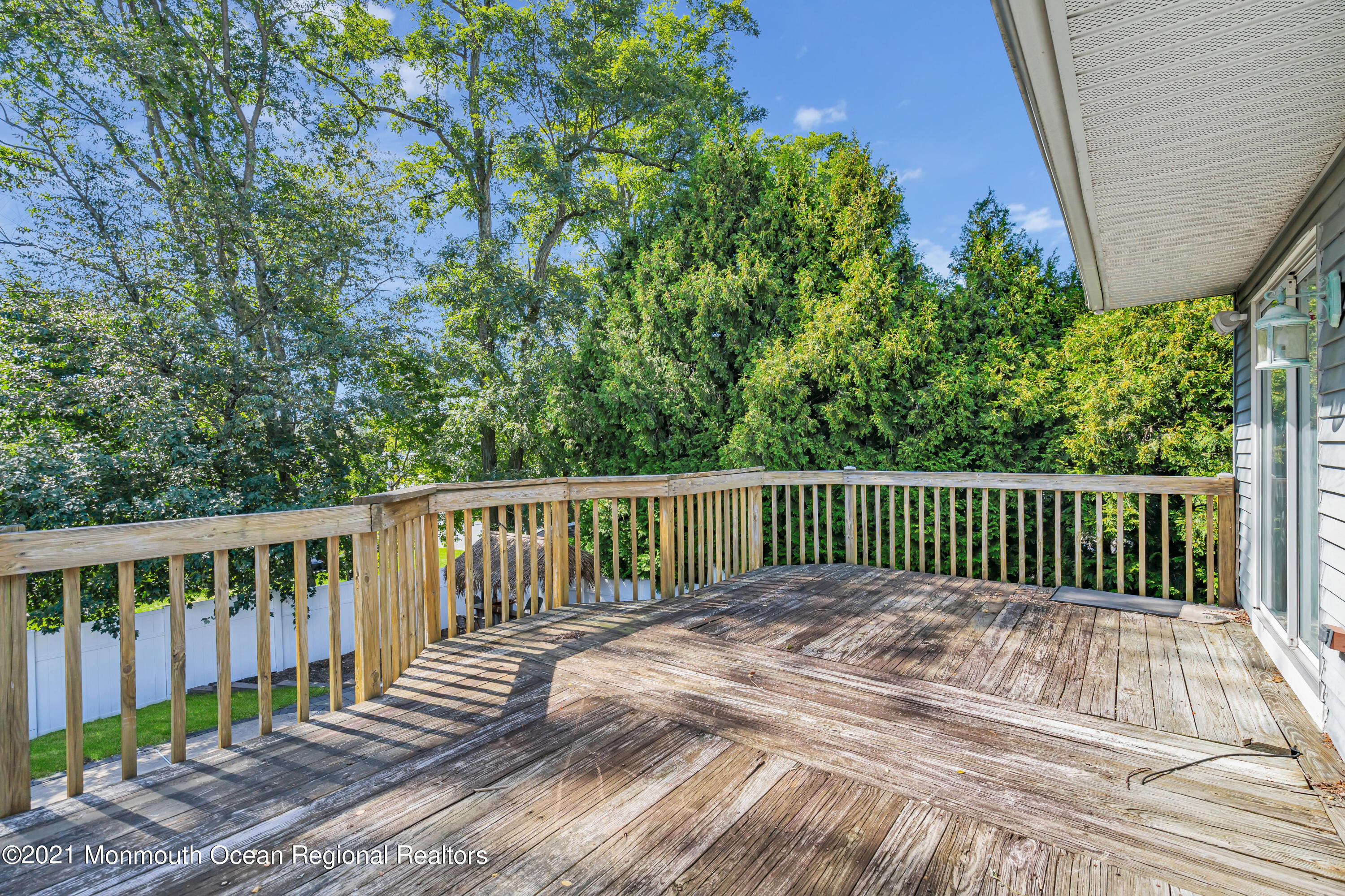 16 Marc Drive Howell, NJ 07731 - Photo 23 of 29 a view of a wooden roof deck