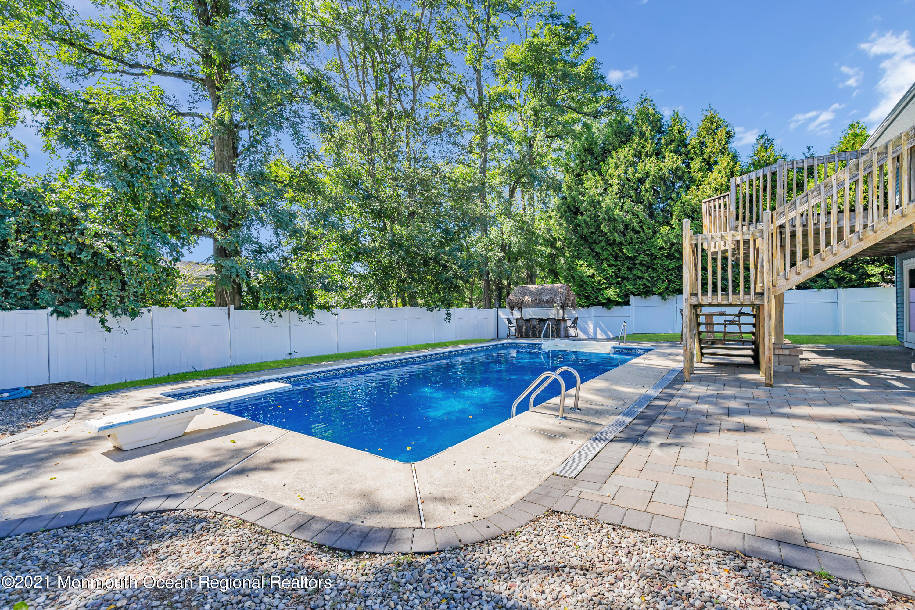 16 Marc Drive Howell, NJ 07731 - Photo 26 of 29 a view of a swimming pool with a patio