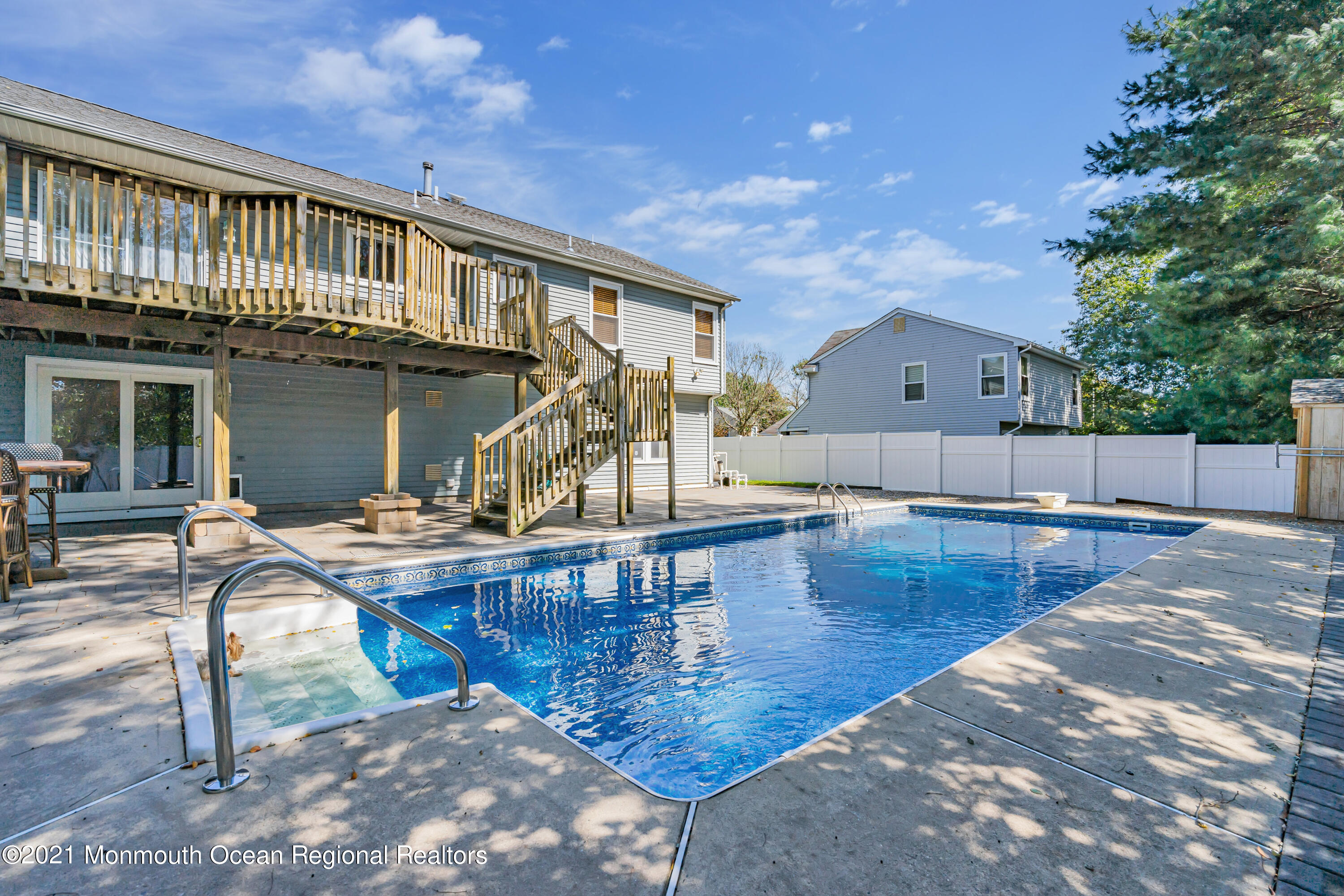 16 Marc Drive Howell, NJ 07731 - Photo 27 of 29 a view of house with swimming pool and sitting area