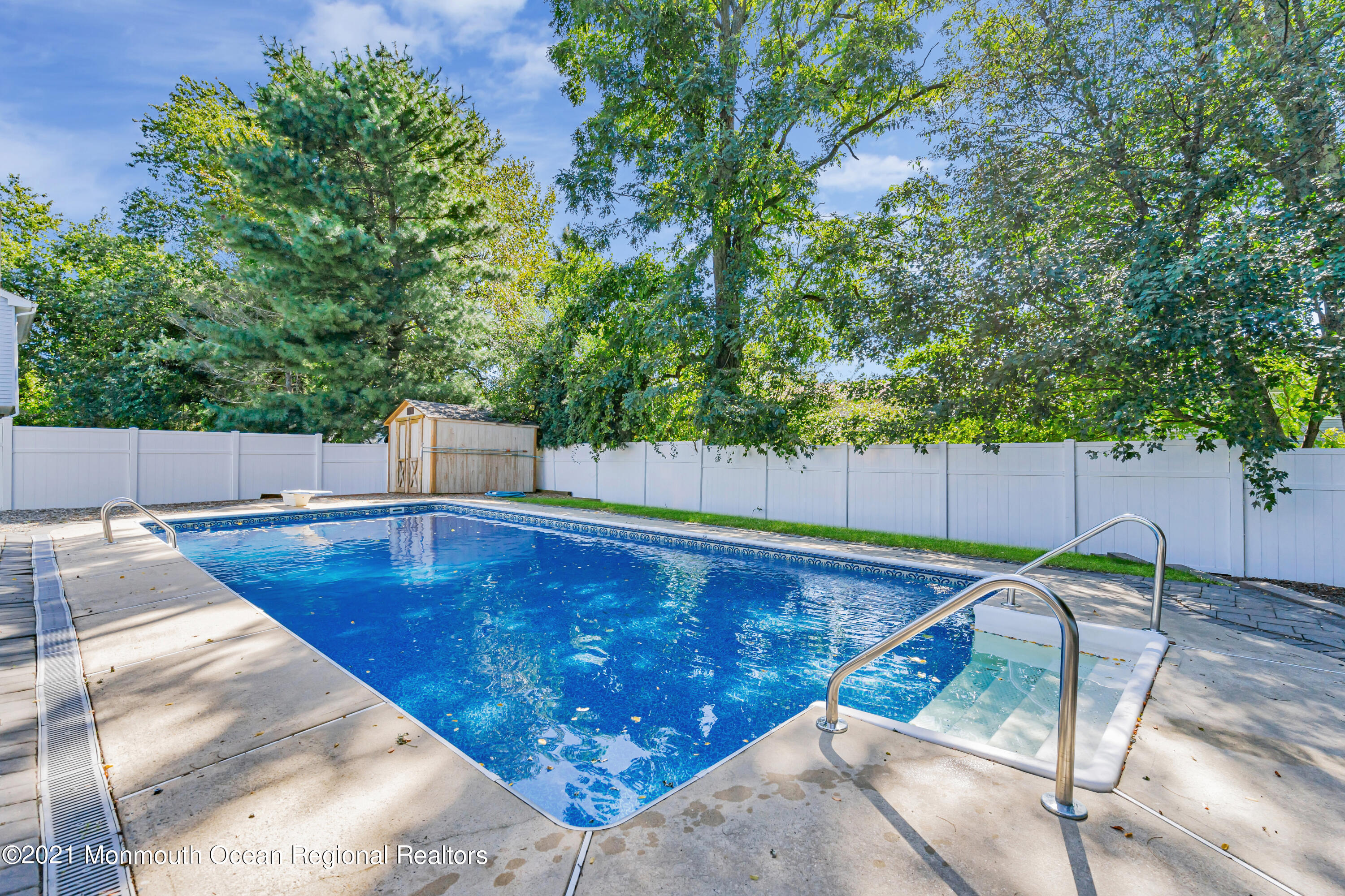 16 Marc Drive Howell, NJ 07731 - Photo 28 of 29 a view of a backyard with swimming pool