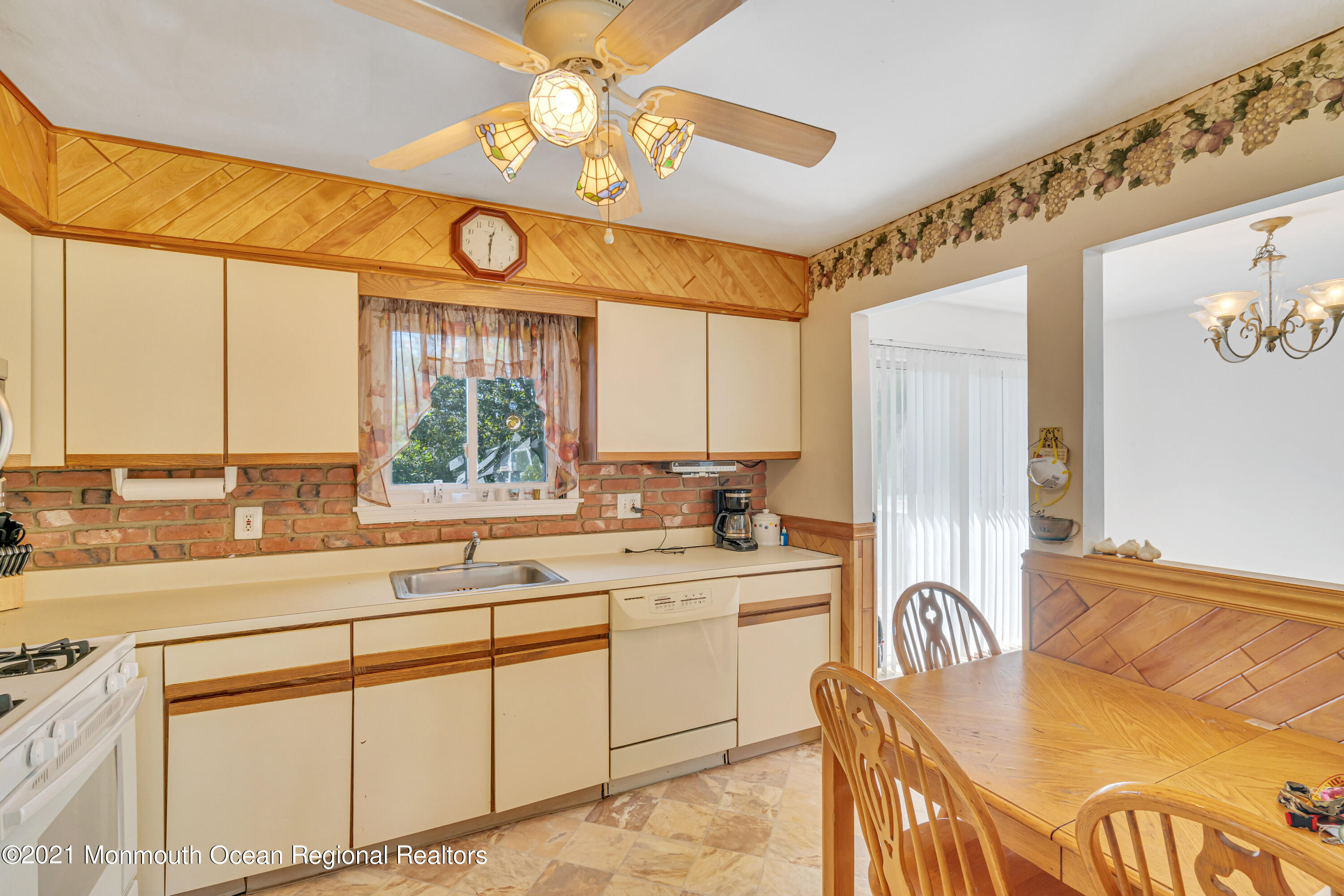 16 Marc Drive Howell, NJ 07731 - Photo 7 of 29 a kitchen with a sink a counter top space and appliances