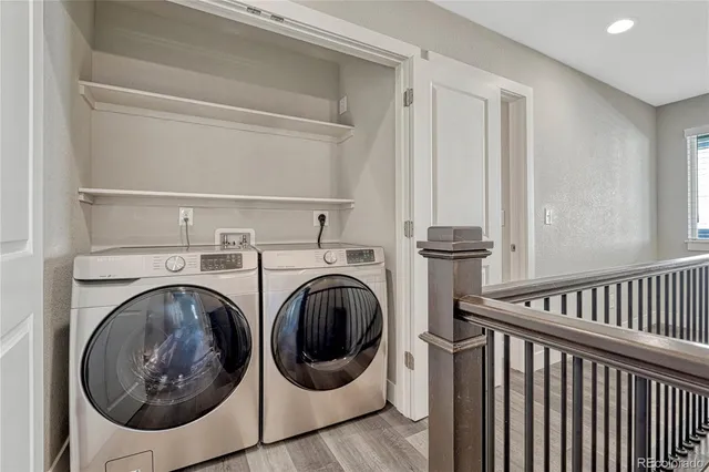 a utility room with dryer and washer