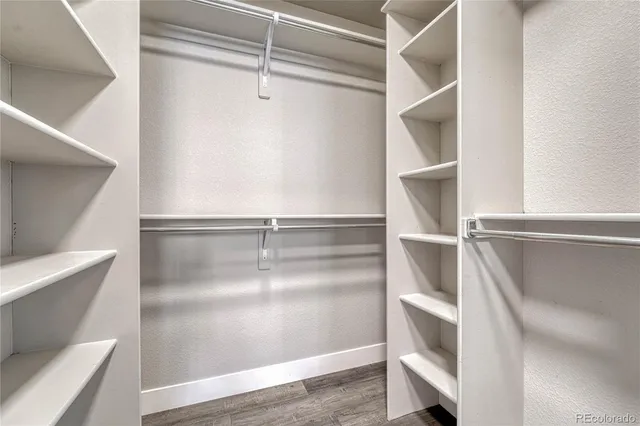 a view of an empty walk in closet