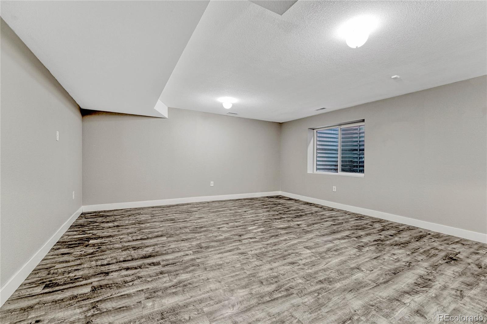 923 Raleigh Street Denver, CO 80204 - Photo 25 of 35 a view of an empty room and window