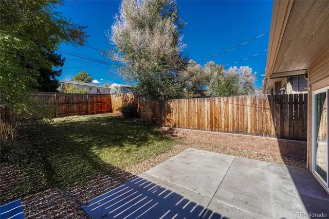 a view of a backyard with a small cabin