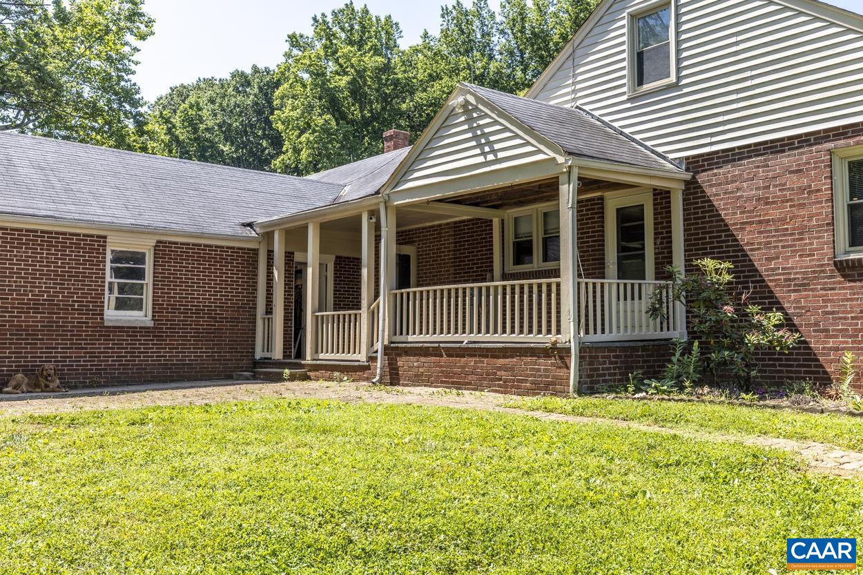 1118 Wolf Trap Road Charlottesville, VA 22911 - Photo 1 of 64 a front view of a house with a yard