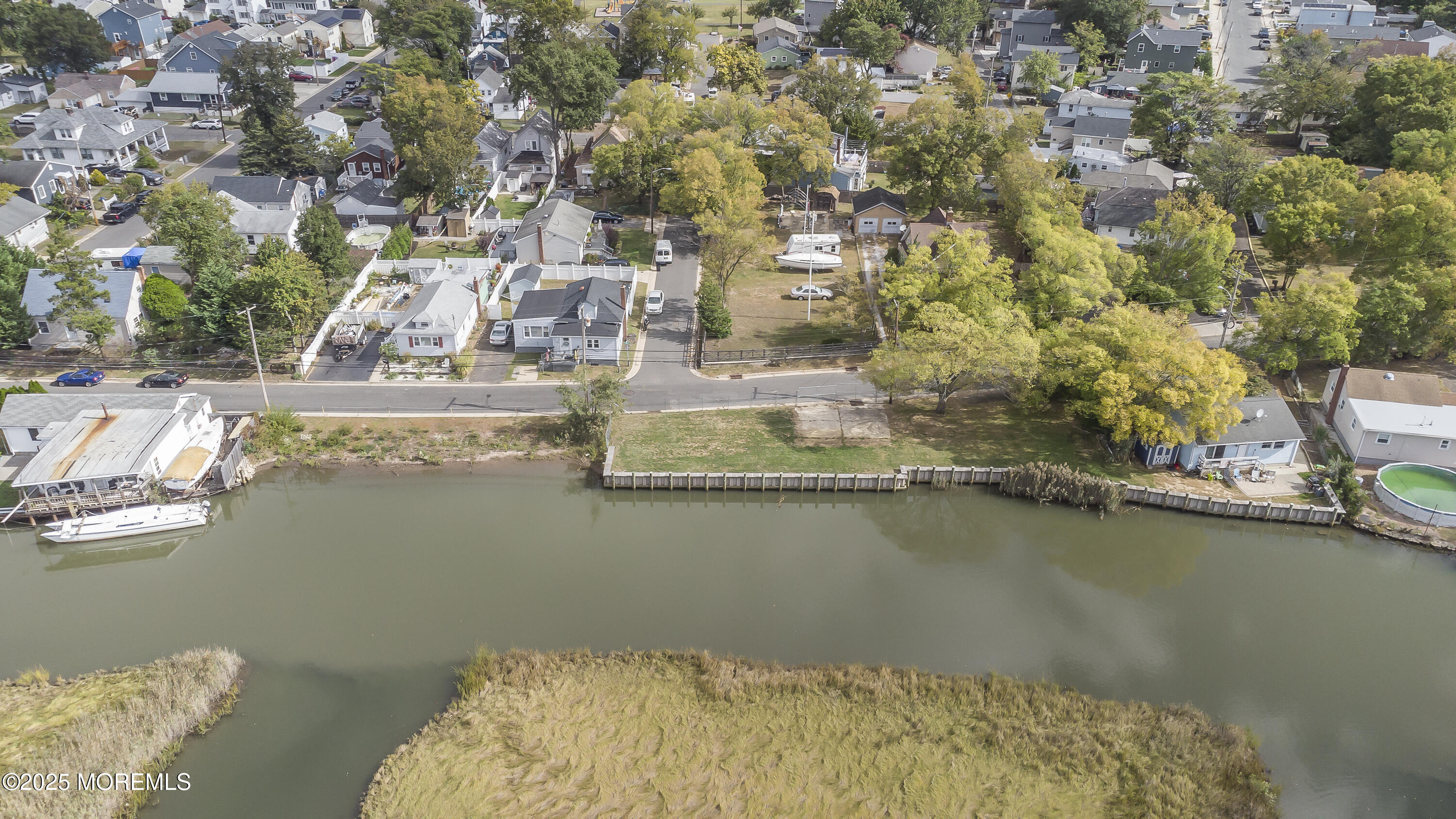 103 Creek Road Keansburg, NJ 07734 - Photo 19 of 34 a view of a lake with a house