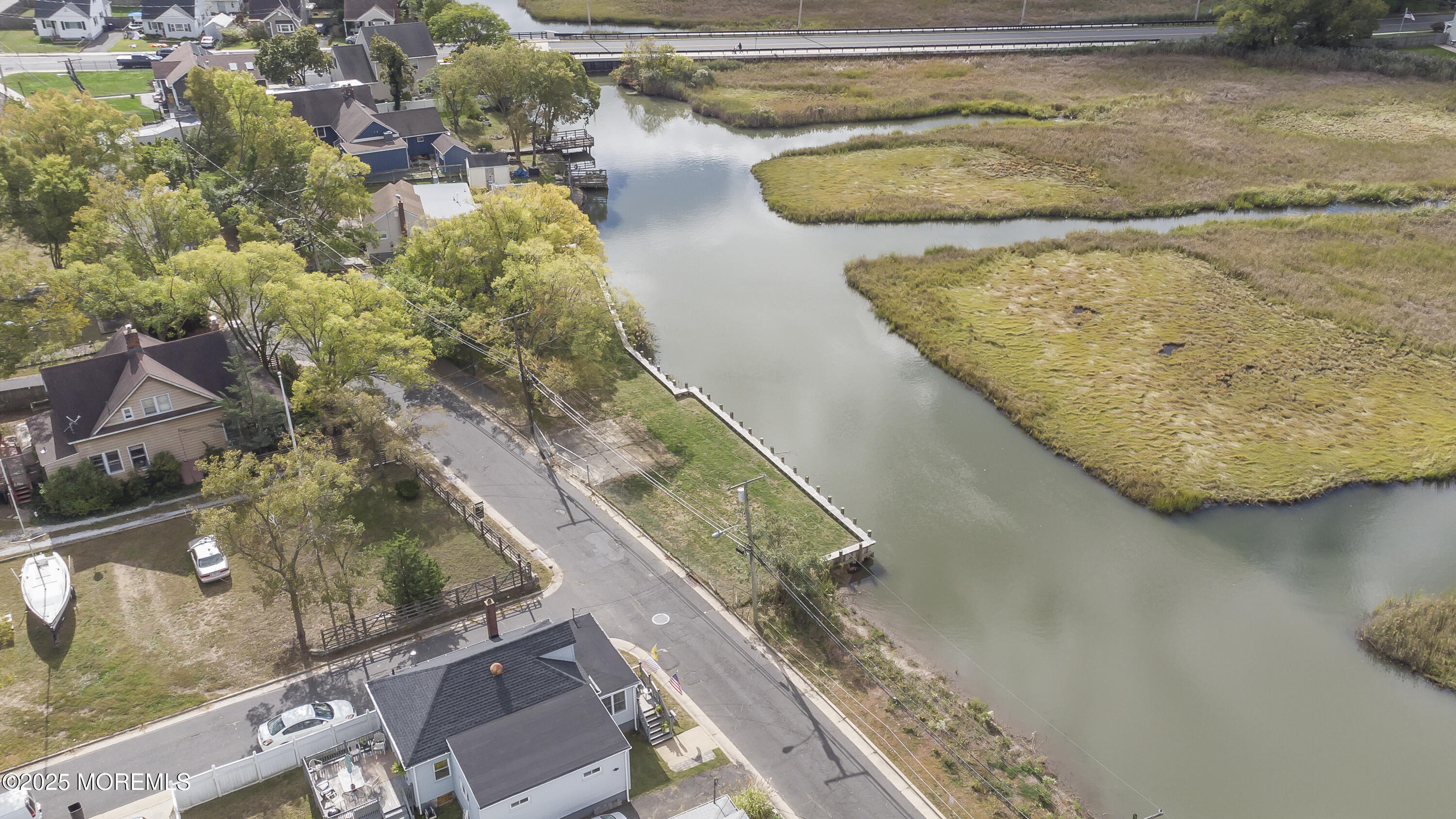 103 Creek Road Keansburg, NJ 07734 - Photo 22 of 34 a view of a wooden floor and a lake view