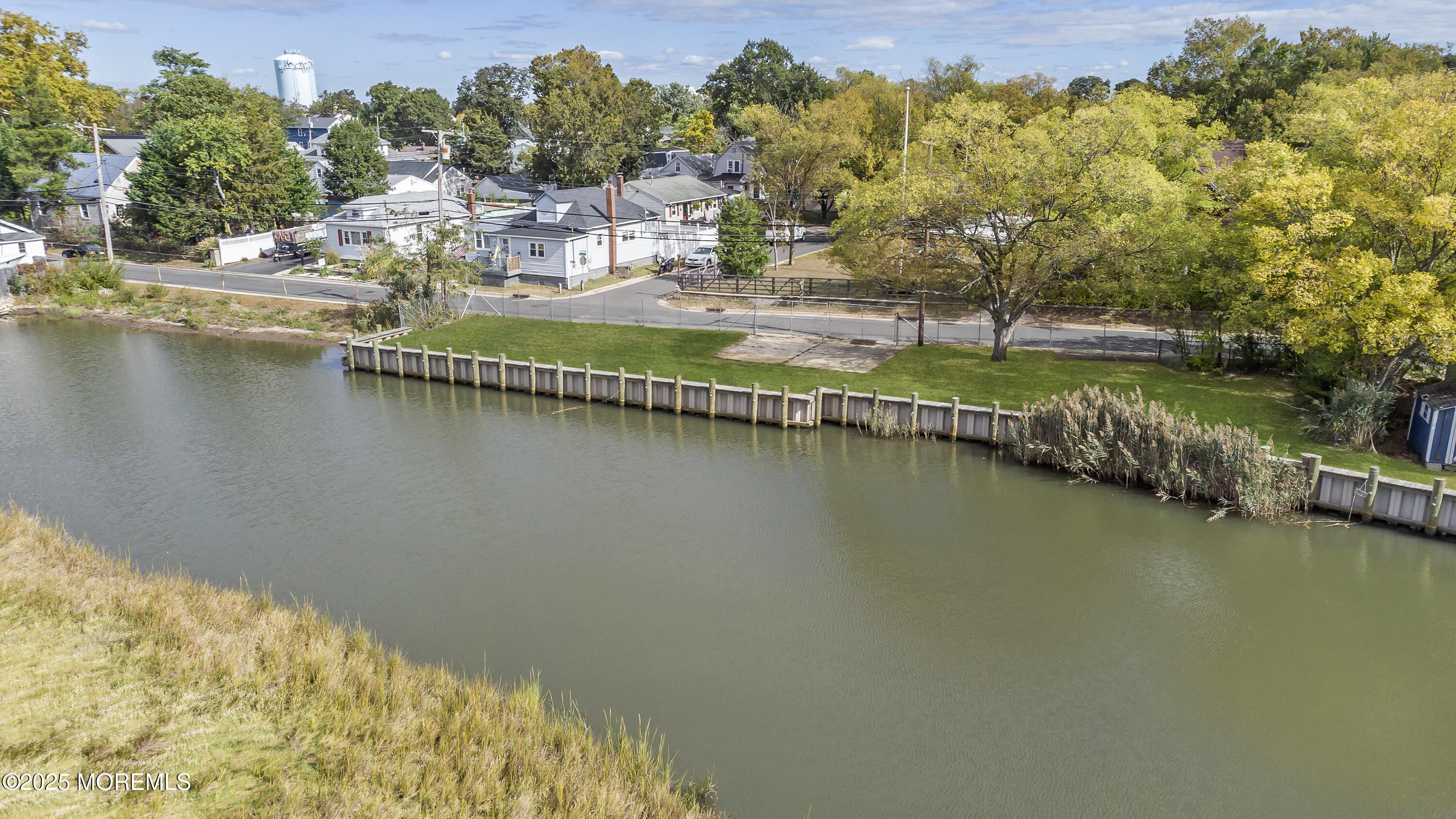 103 Creek Road Keansburg, NJ 07734 - Photo 3 of 34 an aerial view of residential houses with outdoor space and lake view