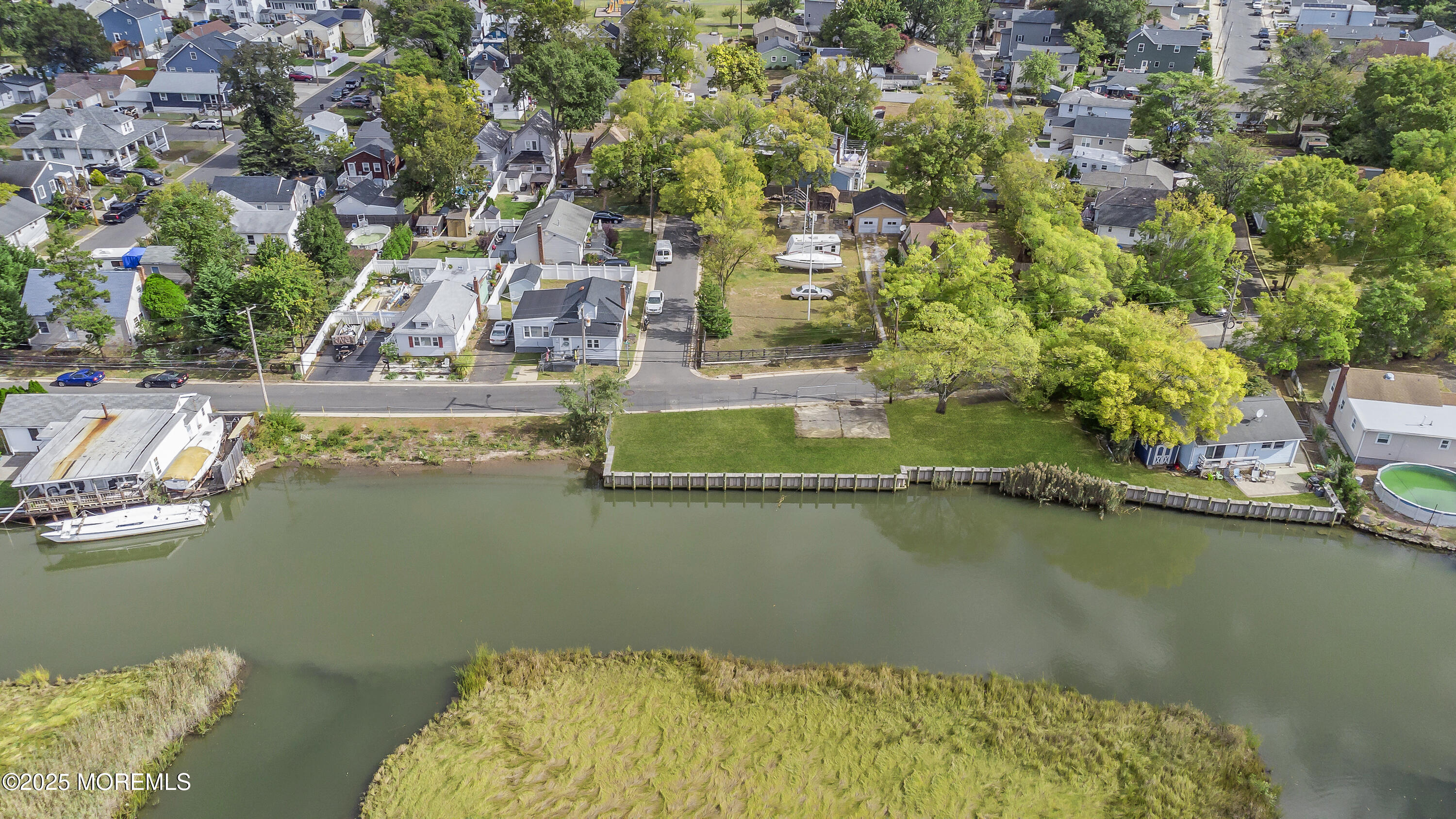 103 Creek Road Keansburg, NJ 07734 - Photo 6 of 34 a view of a lake with a house