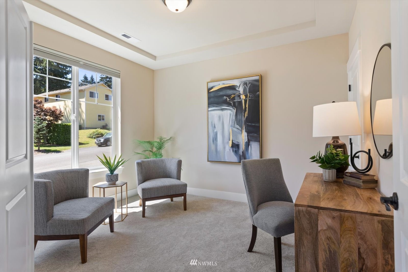 5014 Northeast 24th Street Renton, WA 98059 - Photo 17 of 37 a living room with furniture and a potted plant