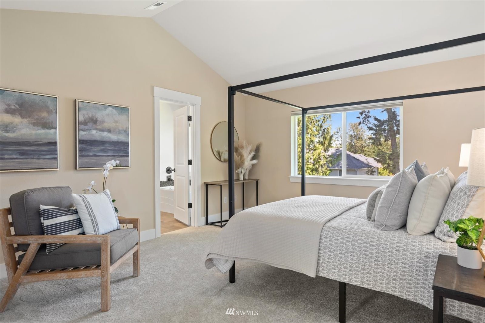 5014 Northeast 24th Street Renton, WA 98059 - Photo 20 of 37 a bedroom with a bed and a chair