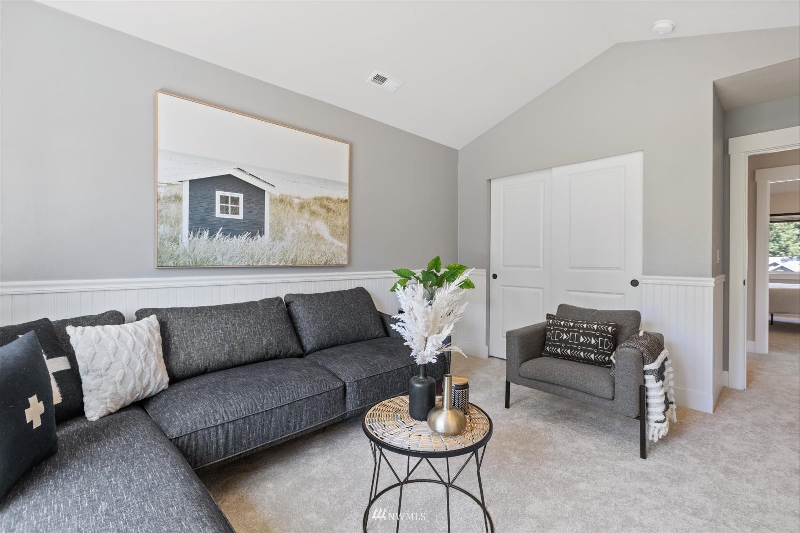 5014 Northeast 24th Street Renton, WA 98059 - Photo 28 of 37 a living room with furniture and a potted plant
