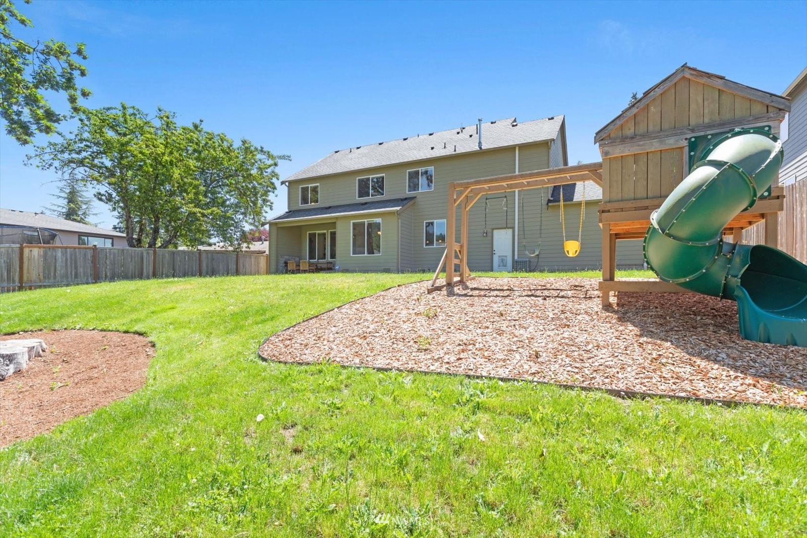 5014 Northeast 24th Street Renton, WA 98059 - Photo 3 of 37 a view of a house with a backyard