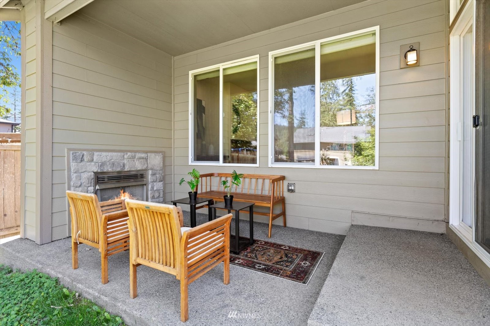 5014 Northeast 24th Street Renton, WA 98059 - Photo 32 of 37 a outdoor living space with patio furniture and a window