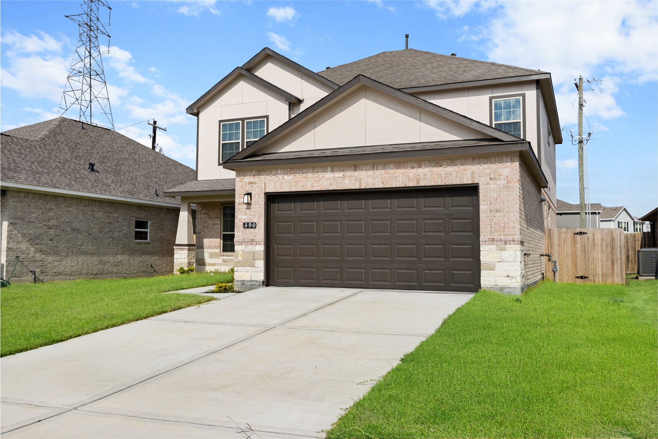8322 Amethyst Valley Lane Angleton, TX 77515 - Photo 12 of 39 a front view of a house with a yard and garage