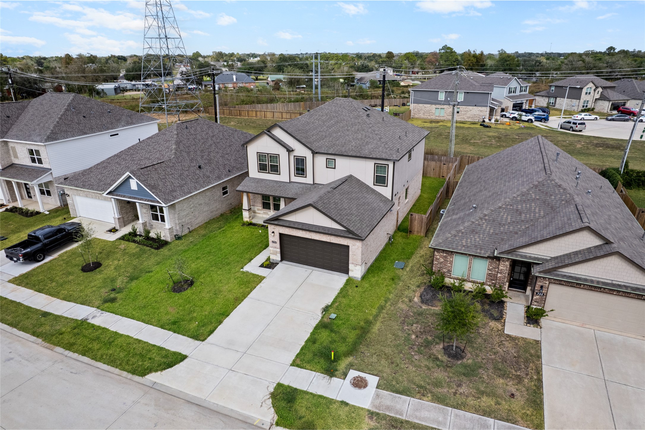 8322 Amethyst Valley Lane Angleton, TX 77515 - Photo 13 of 39 an aerial view of a house with garden space and street view