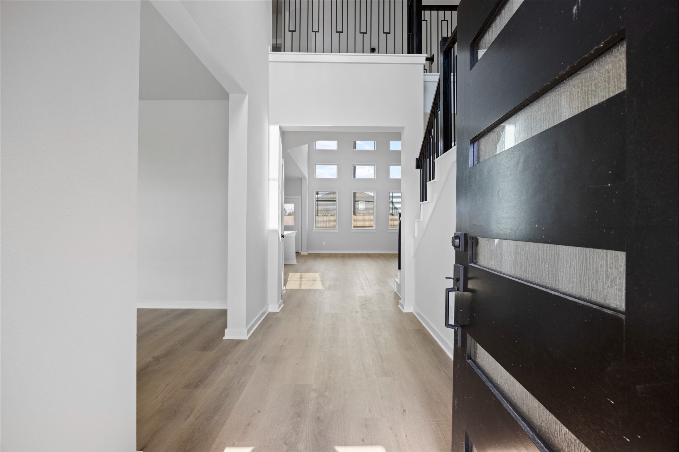 8322 Amethyst Valley Lane Angleton, TX 77515 - Photo 16 of 39 a view of hallway with wooden floor