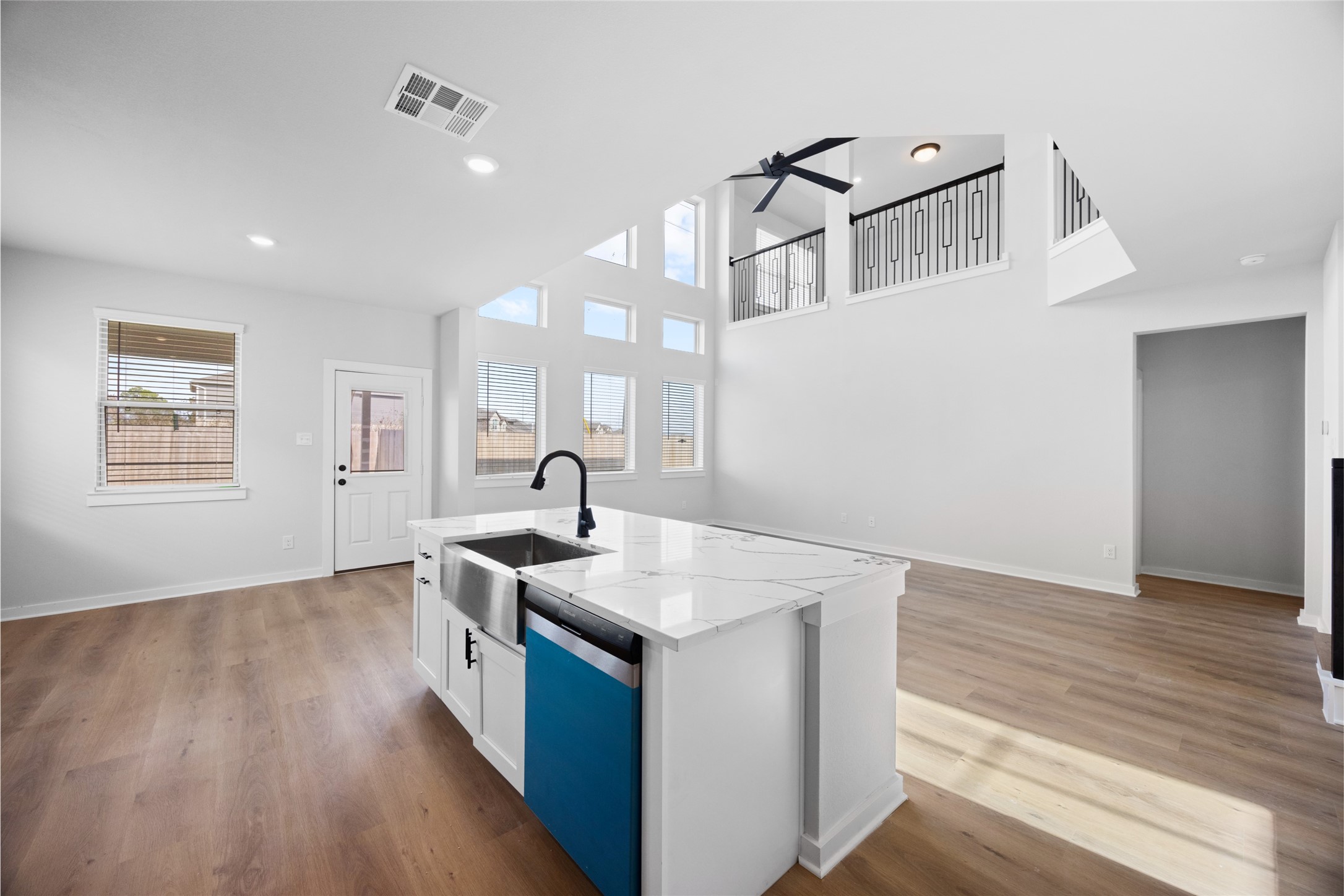 8322 Amethyst Valley Lane Angleton, TX 77515 - Photo 20 of 39 a kitchen with a sink and wooden floor