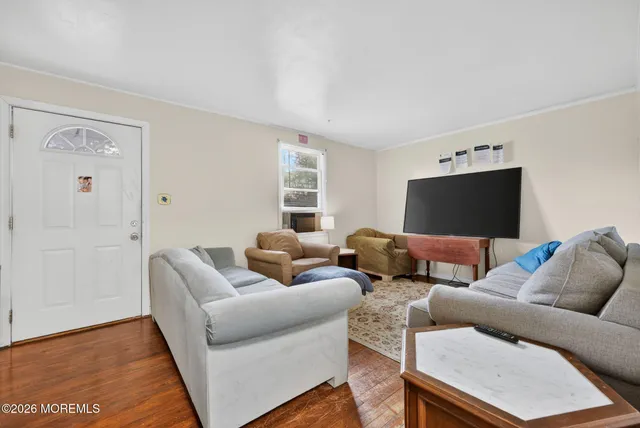 a living room with furniture and a couch