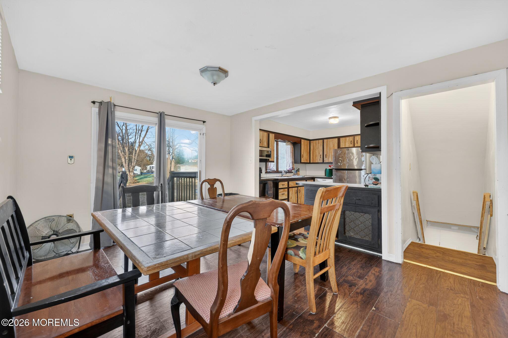 438 Ewingville Road Ewing, NJ 08638 - Photo 28 of 44 a view of a dining room with furniture and wooden floor