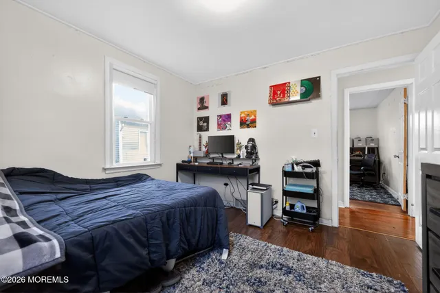 a bedroom with a bed and a table in it