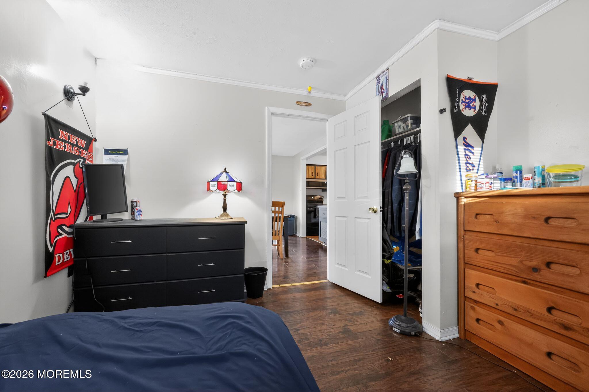 438 Ewingville Road Ewing, NJ 08638 - Photo 32 of 44 a bedroom with a bed and a dresser