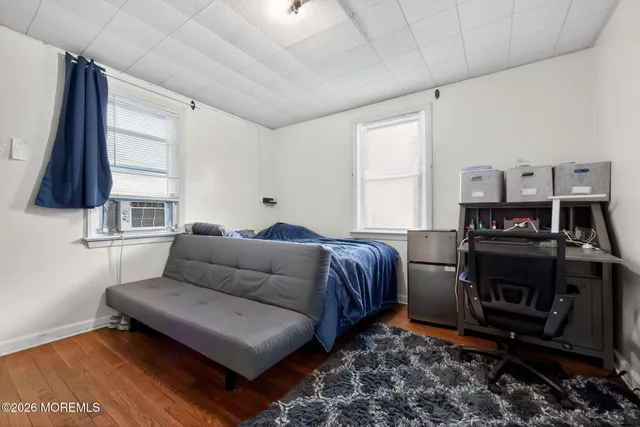 a living room with a couch and a flat screen tv