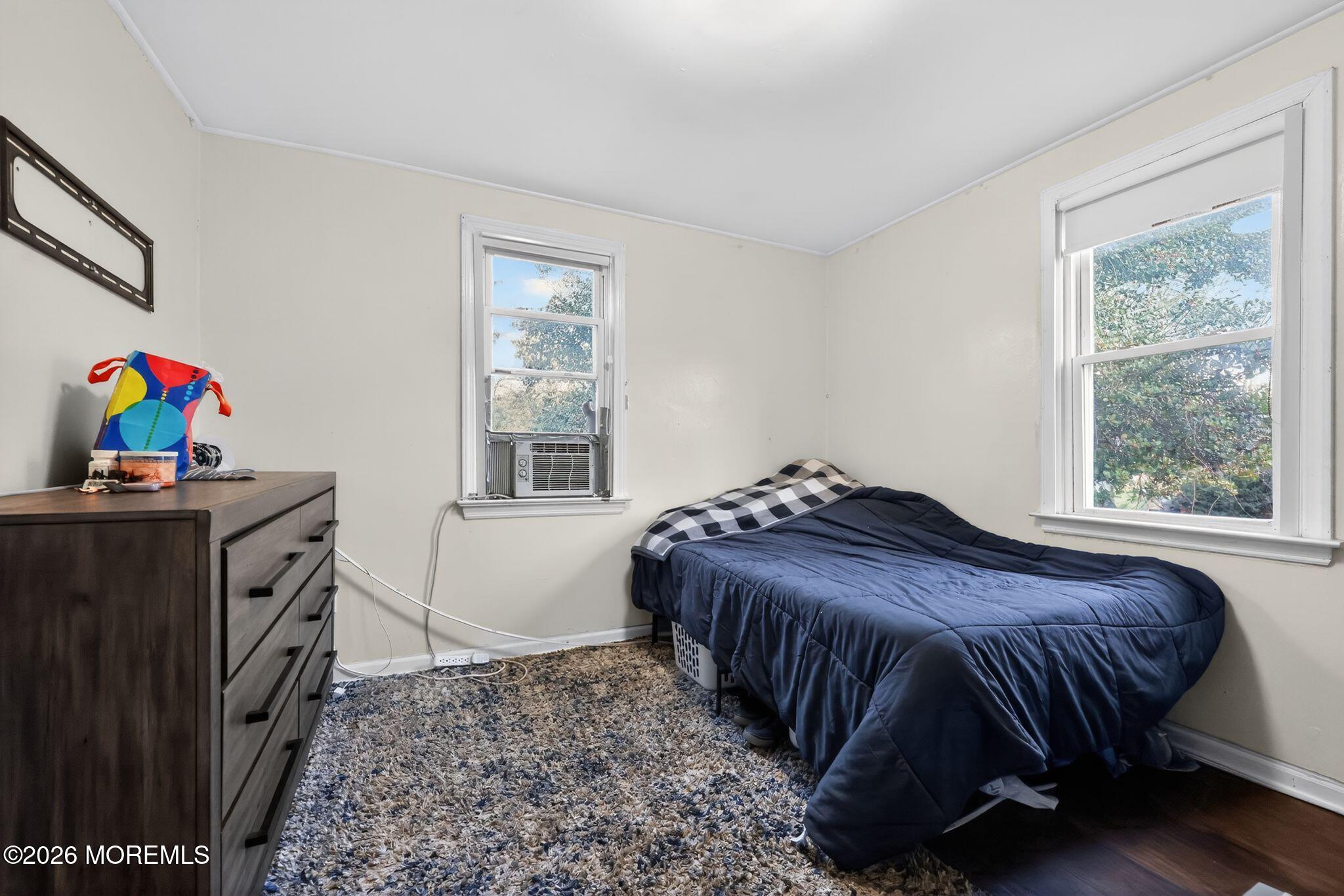 438 Ewingville Road Ewing, NJ 08638 - Photo 37 of 44 a bedroom with a bed and a window