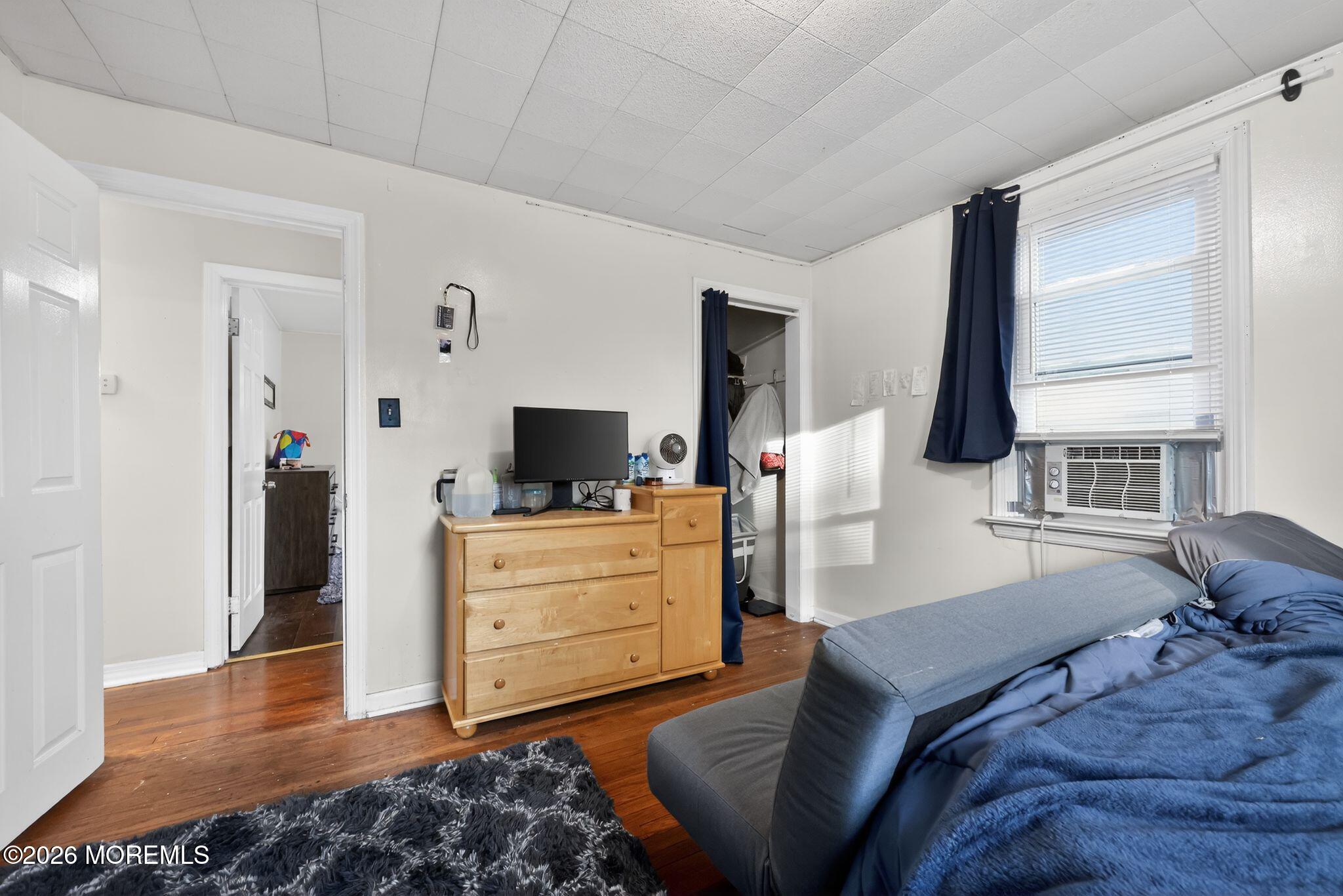 438 Ewingville Road Ewing, NJ 08638 - Photo 38 of 44 a bedroom with furniture and a flat screen tv