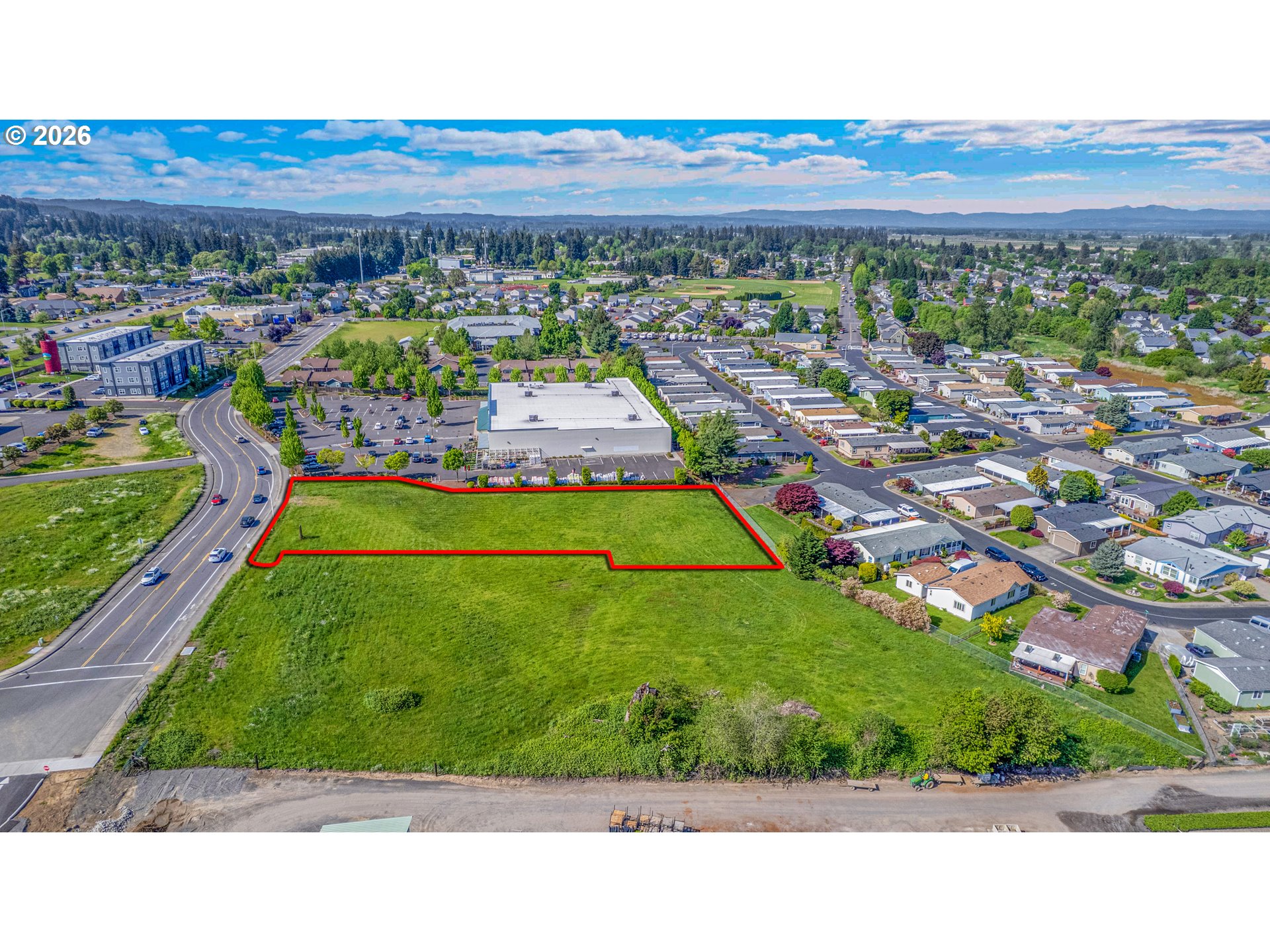 2nd Street, Unit PLAT 2 Scappoose, OR 97056 - Photo 12 of 12 a view of a backyard with a garden