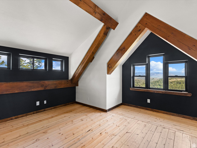 1225 Old Oregon Road Soda Springs, ID 83276 - Photo 33 of 67 Attic space featuring exposed natural wood beams and light wood-finish flooring